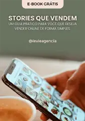 Uma capa de livro com o título 'Stories que Vendem - Um guia prático para você que deseja vender online de forma simples'. Abaixo do título, há uma imagem de uma mão mexendo em um celular, com um copo de café ao lado